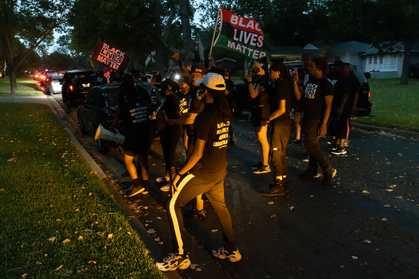 Photos: Protesters march down U.S. 75, chant outside home of Dallas mayor to call for racial justice